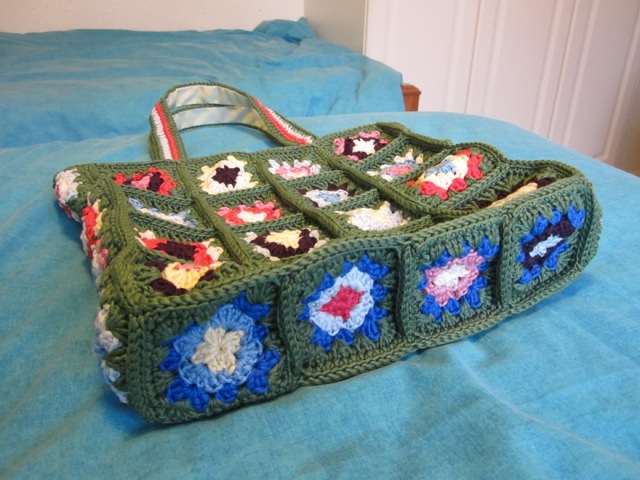 Base of the patchwork crochet project bag Patchwork crochet project bag - open ©The House of Jones